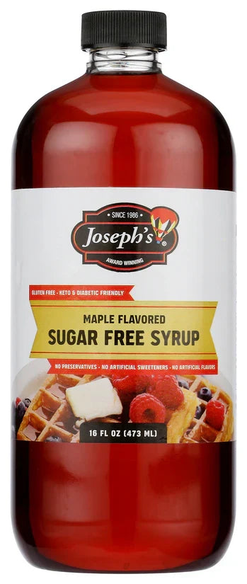 A clear plastic bottle of Joseph's maple-flavored sugar-free syrup, labeled as gluten-free and diabetic-friendly, featuring a colorful image of waffles topped with berries on the front.