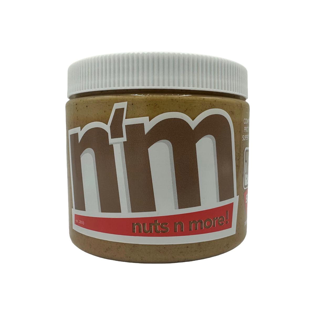 A close-up of a jar of "Nuts n More" nut butter, featuring a white lid and a label with bold brown and red text, set against a black background.