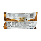 The back of a package of Lily's Salted Caramel Chocolate Chip Cookies displays nutritional information, ingredients, and a photo of the cookies, set against a light brown background.