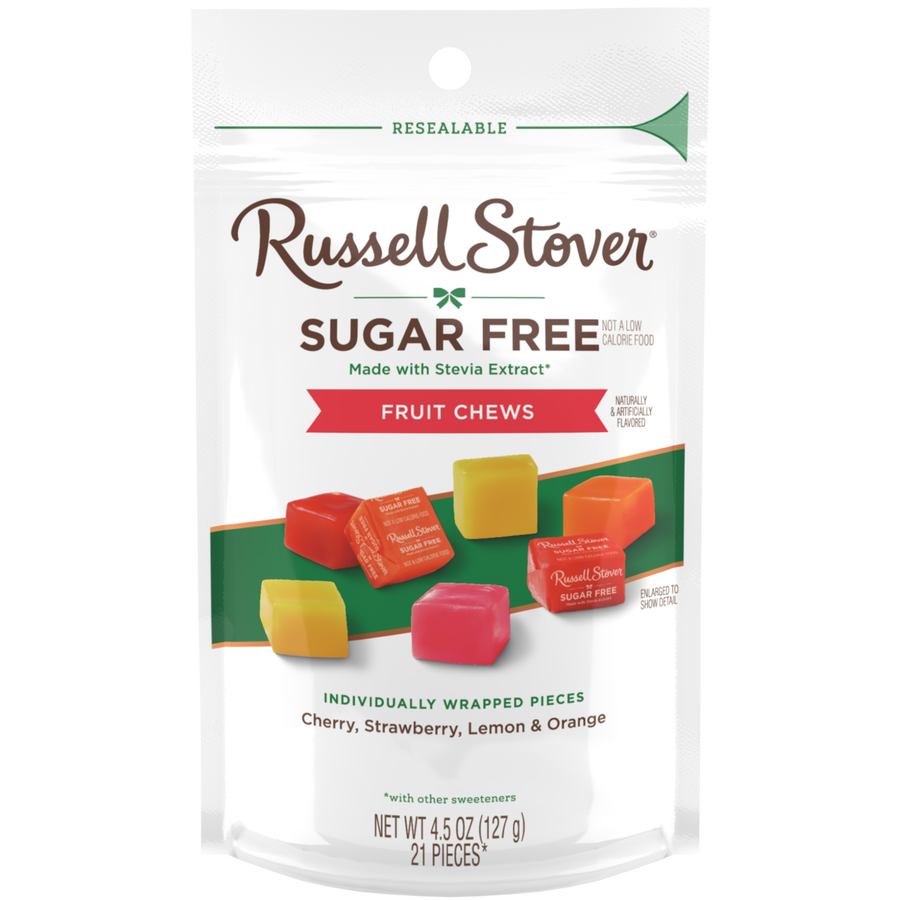 A resealable bag of Russell Stover Sugar Free Fruit Chews, featuring individually wrapped pieces in cherry, strawberry, lemon, and orange flavors, is displayed with colorful candies on a white background.