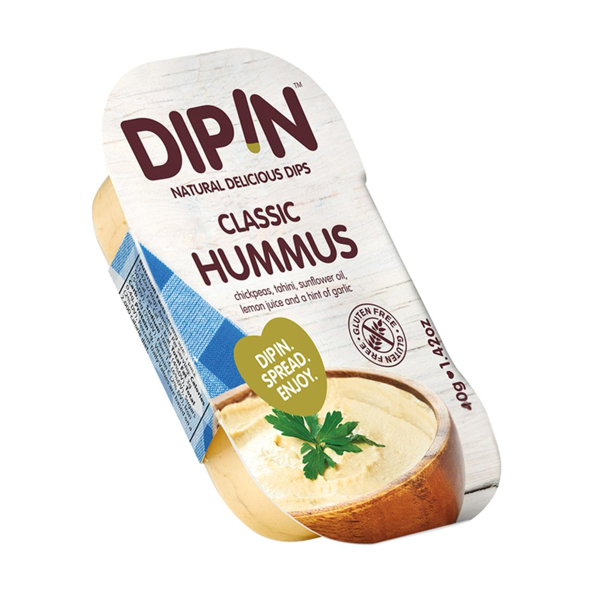 A container of DIP IN classic hummus, featuring a creamy texture topped with a sprig of parsley, is displayed with a label highlighting its gluten-free ingredients and serving suggestions.