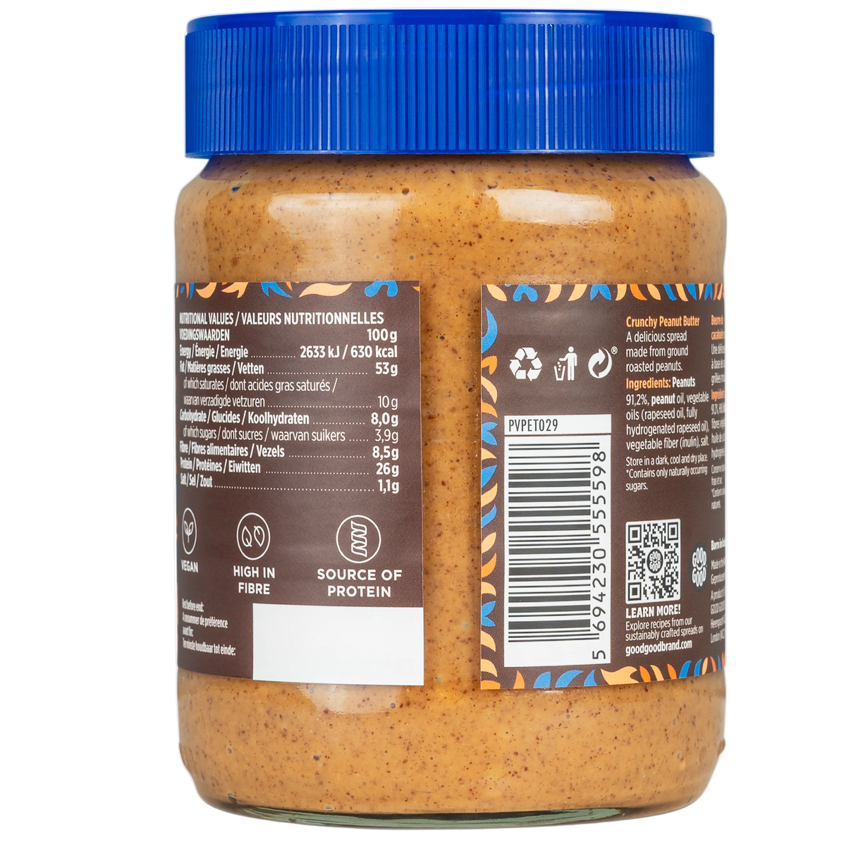 A jar of crunchy peanut butter with a blue lid displays nutritional information and ingredients on a brown label, emphasizing its vegan status and high fiber content.
