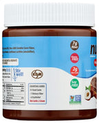 A brown jar of nut butter features a white lid, with labels highlighting nutritional information, including 7g fiber, 2g net carbs, and dietary claims like gluten-free and soy-free.
