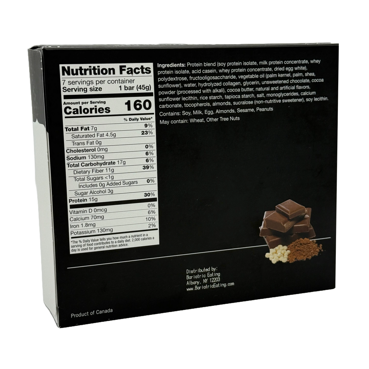 A black nutrition facts label on a protein bar box displays serving size, calories, and ingredients, alongside pieces of chocolate and nuts, highlighting its nutritional content and flavors.