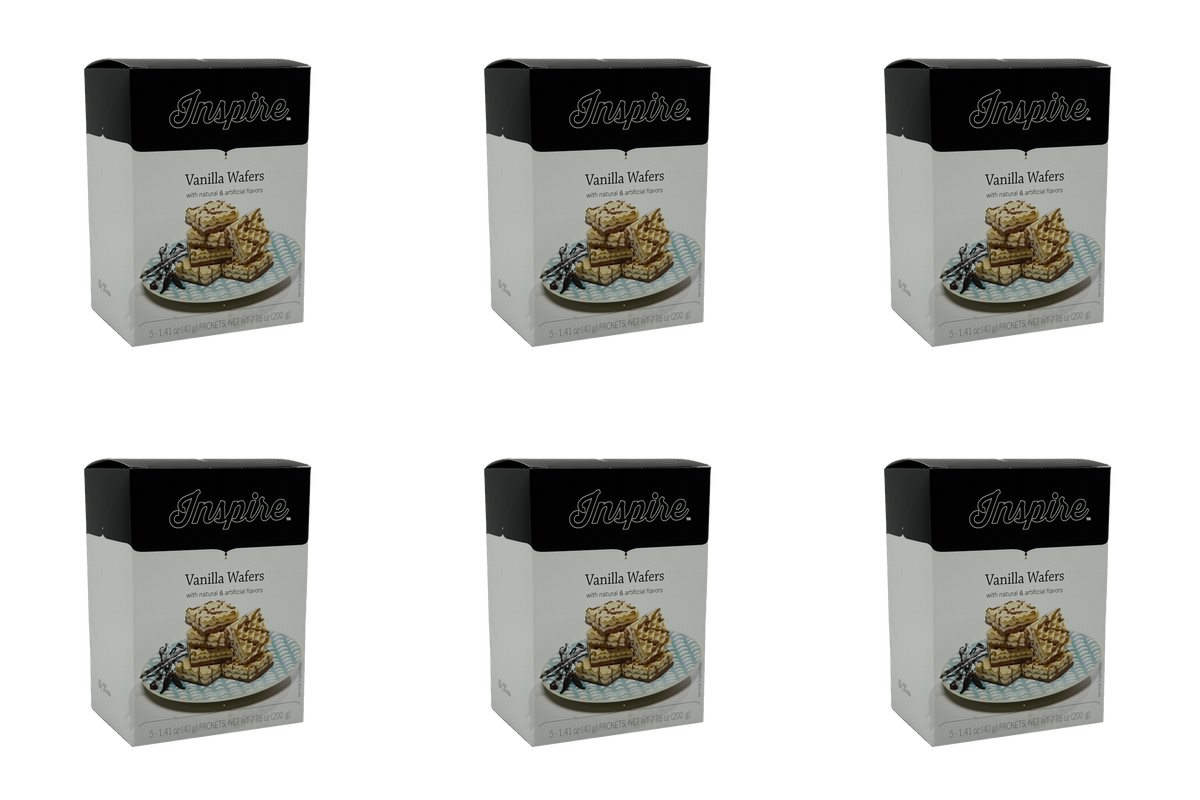 Six boxes of Inspire Vanilla Wafers are arranged in a grid, each displaying a stack of wafers on a plate with a decorative background, highlighting the product's branding and flavor.