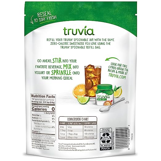 A green and white pouch of Truvia sweetener features instructions for use, a nutrition facts label, and images of citrus fruits, emphasizing its zero-calorie sweetness for various foods and beverages.