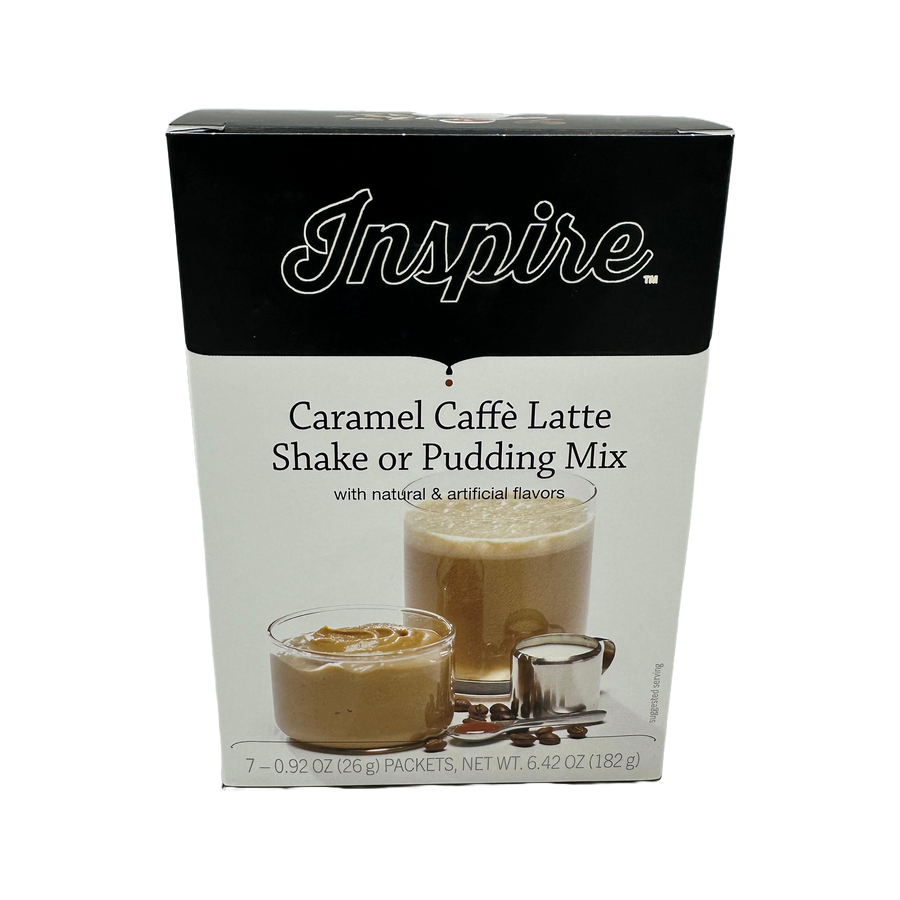 A box of Inspire Caramel Caffè Latte Shake or Pudding Mix displays two servings in glass cups, one with a creamy texture and the other topped with caramel, alongside a measuring spoon and coffee beans.