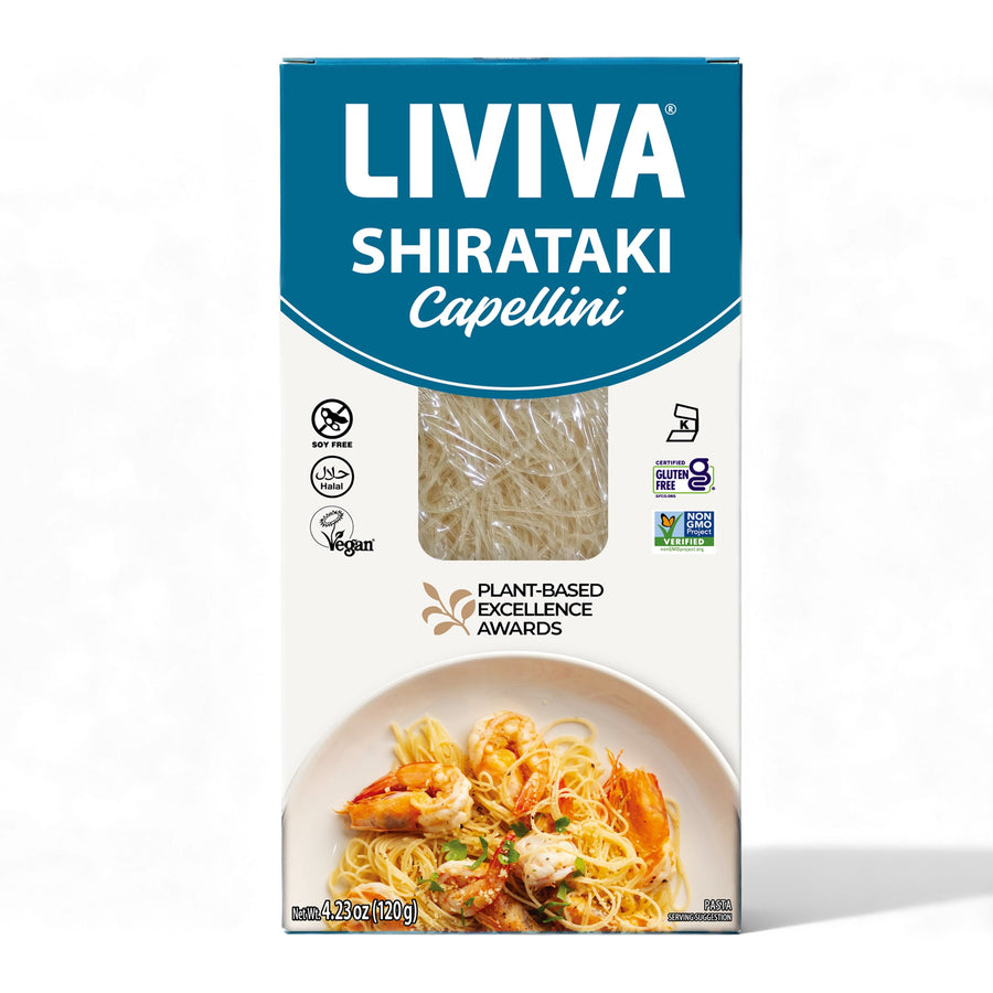 A box of Liviva Shirataki Capellini pasta displays a transparent window showing the noodles, with a bowl of cooked pasta and shrimp on the bottom, highlighting its plant-based and gluten-free qualities.