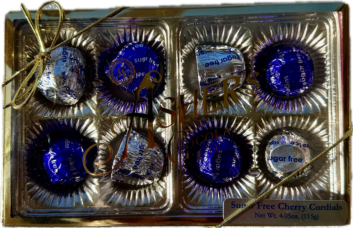 A gold box tied with a ribbon contains eight sugar-free cherry cordials, each wrapped in shiny blue foil, showcasing a premium chocolate gift suitable for special occasions.