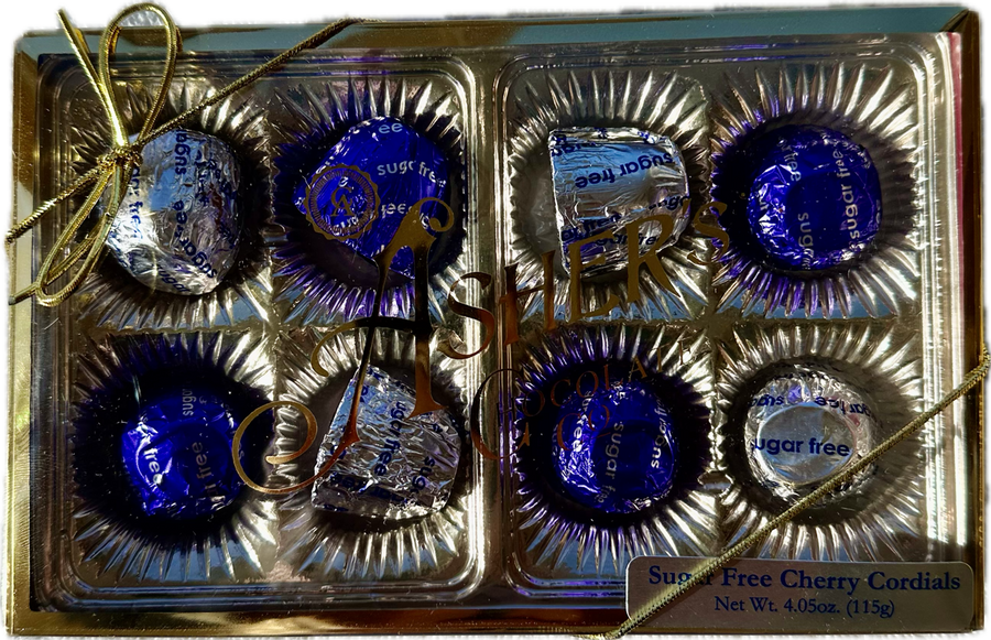 A gold box tied with a ribbon contains eight sugar-free cherry cordials, each wrapped in shiny blue foil, showcasing a premium chocolate gift suitable for special occasions.