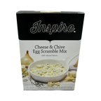 A box of Inspire Cheese & Chive Egg Scramble Mix features a bowl of the mix with a creamy texture, surrounded by chives and an onion, highlighting its natural flavors and packaging details.
