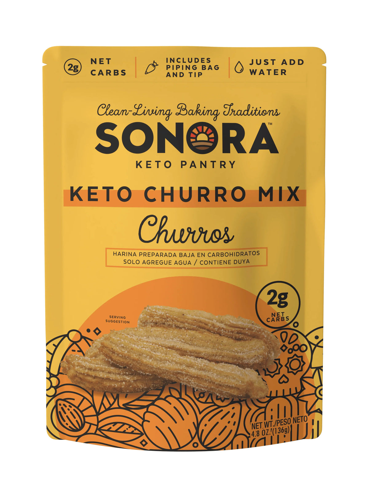 A bright yellow package of Sonora Keto Churro Mix features a photo of churros and text highlighting low net carbs, a piping bag included, and instructions to just add water.