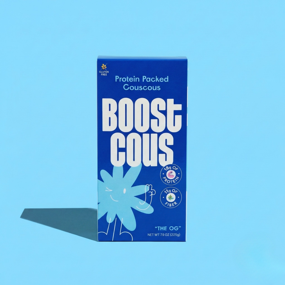A bright blue box of "Boost Cous" protein-packed couscous features playful graphics, highlighting 18 grams of protein and 6 grams of fiber, set against a matching blue background.