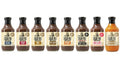 Eight bottles of G Hughes Sugar Free BBQ Sauce in assorted flavors