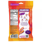 A colorful snack bag labeled "Joyride" features nutrition facts and highlights that the rainbow strips are low in sugar, with a playful design and a QR code for more information.