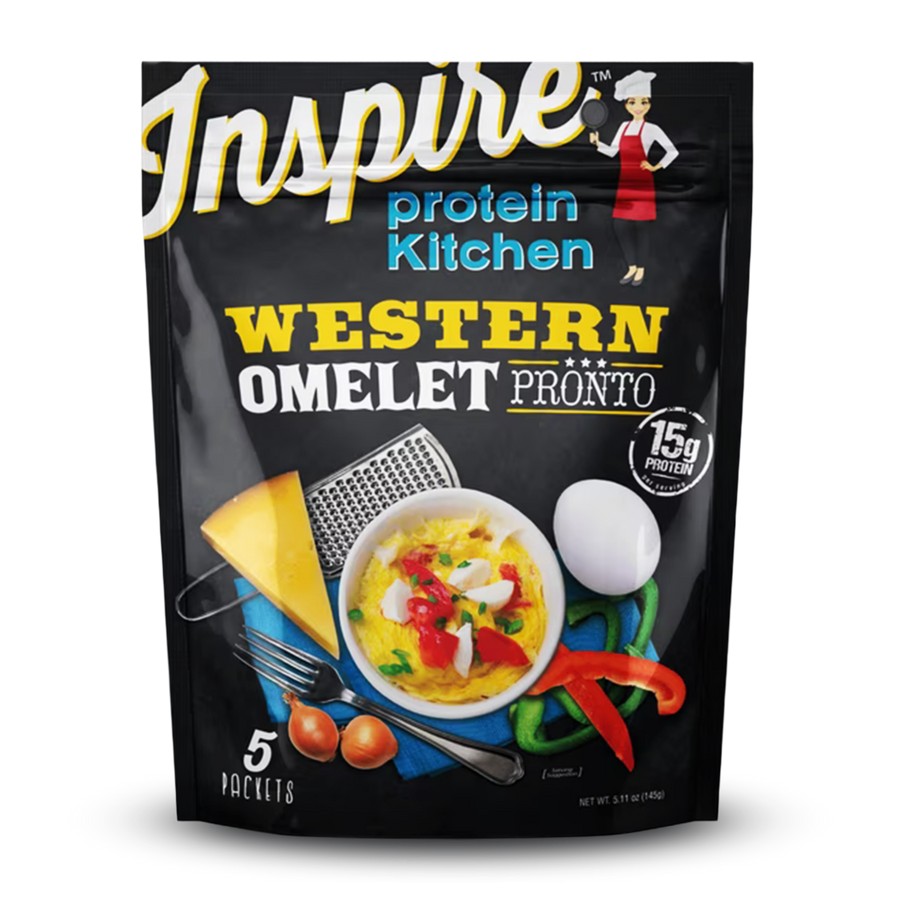 A colorful package of Inspire Protein Kitchen's Western Omelet featuring a cooked omelet topped with vegetables, alongside a cheese wedge, eggs, and utensils, highlighting 15g of protein per serving.