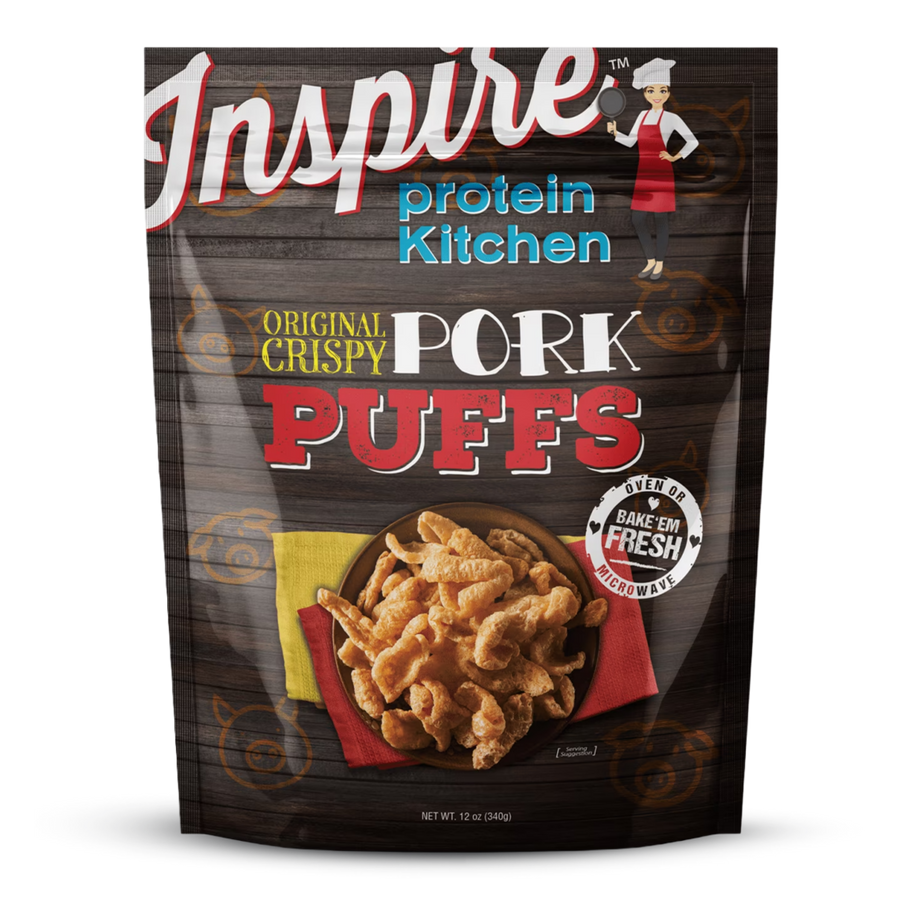 A bag of Inspire brand Original Crispy Pork Puffs displays a colorful design with a chef illustration, featuring the product name prominently and a serving of pork puffs on a plate.