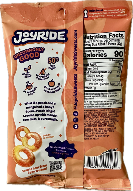 A colorful snack bag for Joyride's peach and mango gummies features playful graphics, highlights low sugar content, and includes a QR code for more information.