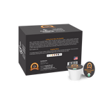 A black box of Alex's Low-Acid Organic Coffee features a note from the founder, cupping notes, and a coffee pod labeled "French Roast," emphasizing its smooth flavor and organic certification.