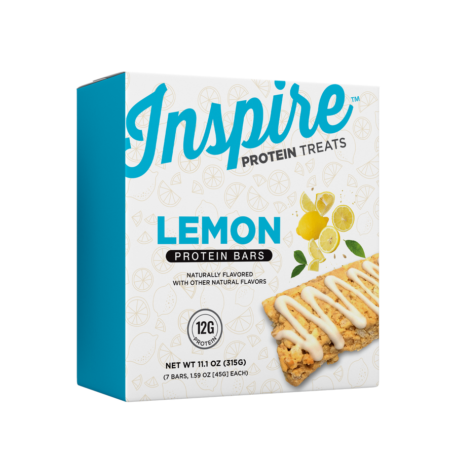 A blue and white box of Inspire Lemon Protein Bars displays a lemon-flavored protein bar drizzled with icing, highlighting its natural flavor and 12 grams of protein per serving.
