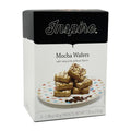 A box of Inspire Mocha Wafers sits beside a plate with stacked wafers drizzled with chocolate, showcasing the product's flavors and packaging details.
