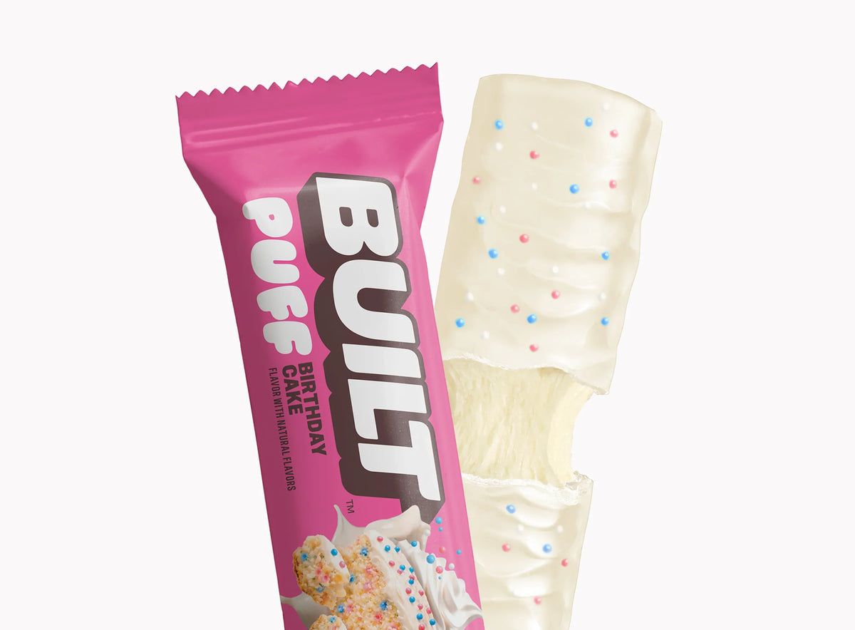 Front package of Built Bar Protein Puffs, Birthday Cake / One Bar