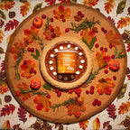 Bootylicious Pumpkin Spice muffin cup in a pumpkin pie with fall decorations