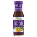 A bottle of Primal Kitchen No Soy Teriyaki Sauce and Marinade features a purple label with white text, highlighting its soy-free and no artificial sweeteners attributes, alongside an orange and garlic illustration.