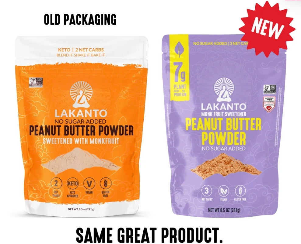 Two bags of Lakanto peanut butter powder side by side, one with orange packaging labeled "Old Packaging" and the other with purple packaging labeled "New," highlighting the product's no sugar added and keto-friendly features.