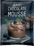 A package of Sukrin chocolate mousse is displayed, featuring a glass dessert topped with blueberries and chocolate shavings, with a label indicating "No added sugar" and serving details.