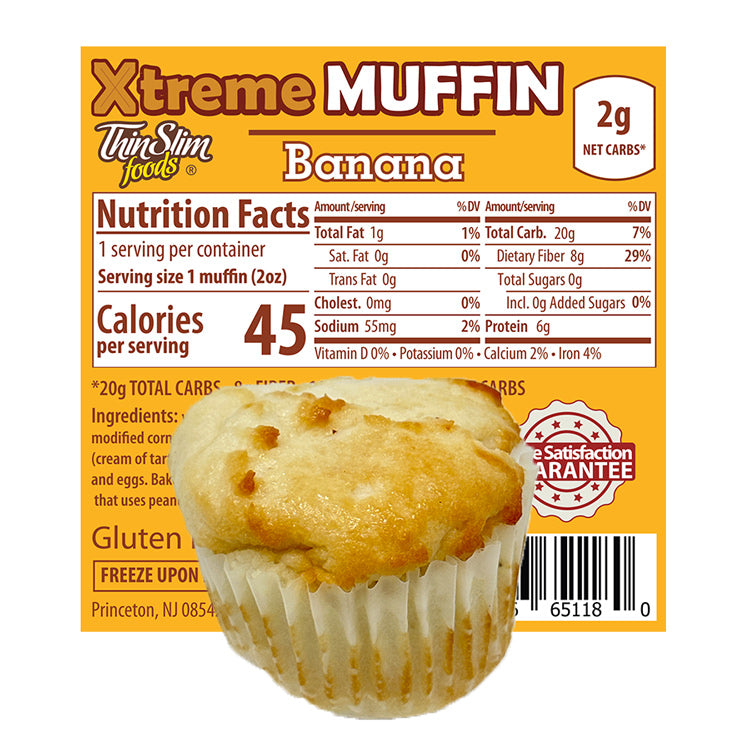 ThinSlim Foods Xtreme Muffins Banana label with Nutrition Facts behind the product on a white background.