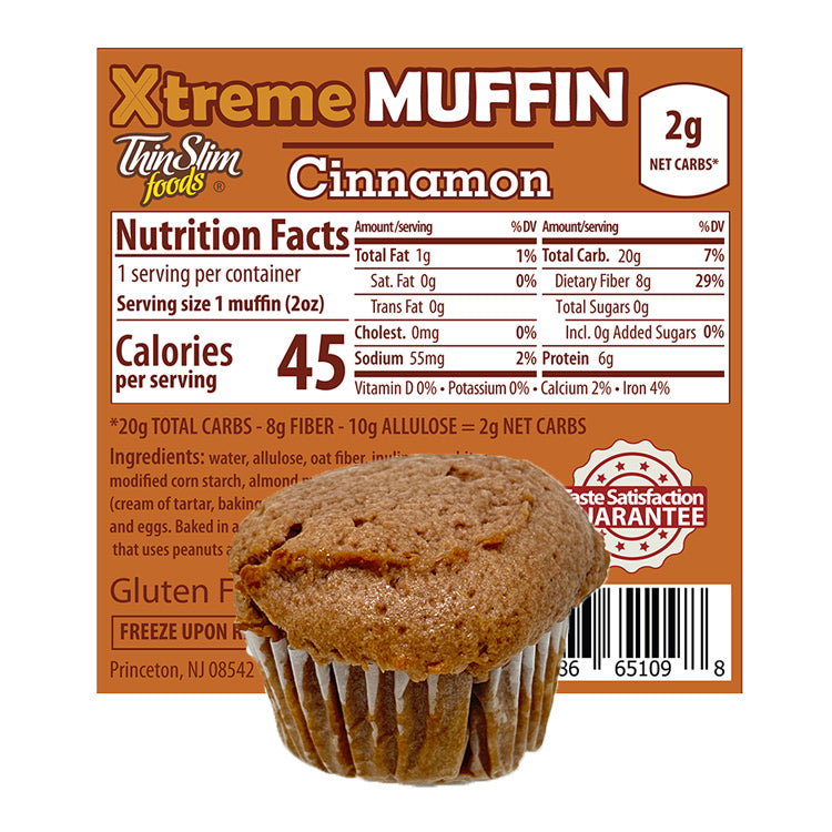ThinSlim Foods Xtreme Muffins Cinnamon label with Nutrition Facts behind the product on a white background.