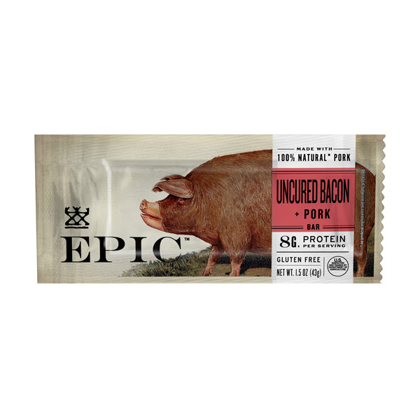 A packaged snack bar labeled "Uncured Bacon + Pork" features an illustration of a pig, highlighting that it is made with 100% natural pork and contains 8 grams of protein per serving, and is gluten-free.