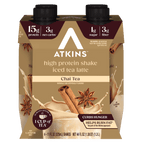 A four-pack of Atkins high protein iced tea latte shakes in chai tea flavor, featuring nutritional information and images of cinnamon sticks and star anise on the packaging.