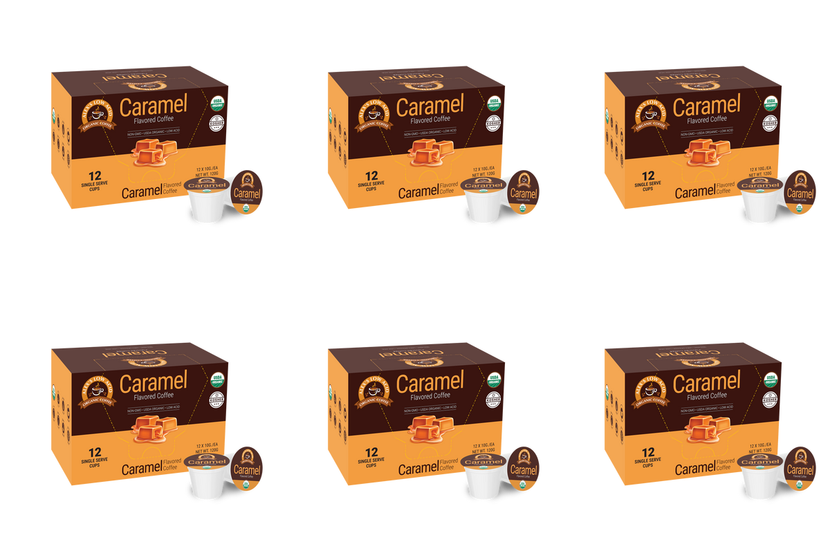 A display of six boxes of caramel-flavored coffee pods, each containing 12 single-serve cups, featuring a caramel candy graphic and USDA organic certification.