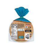 A package of Mission Foods Street Taco Carb Balance Whole Wheat Tortillas, showing the back with nutrition facts, ingredients, and a blue twist tie at the top for sealing.