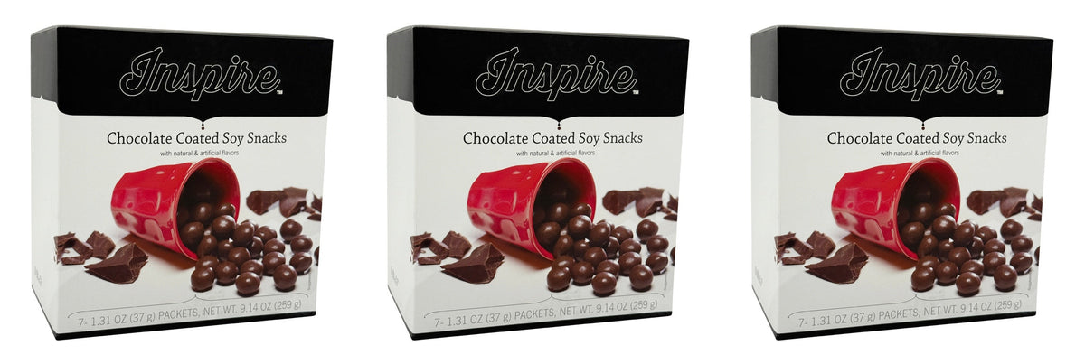Three boxes of "Inspire" Chocolate Coated Soy Snacks are displayed, each featuring a red cup spilling chocolate-covered soy balls and chocolate pieces on a white background.
