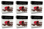 Six boxes of Inspire Chocolate Coated Soy Snacks are displayed, each featuring a red cup spilling chocolate-covered soy balls and pieces of chocolate on a white background.
