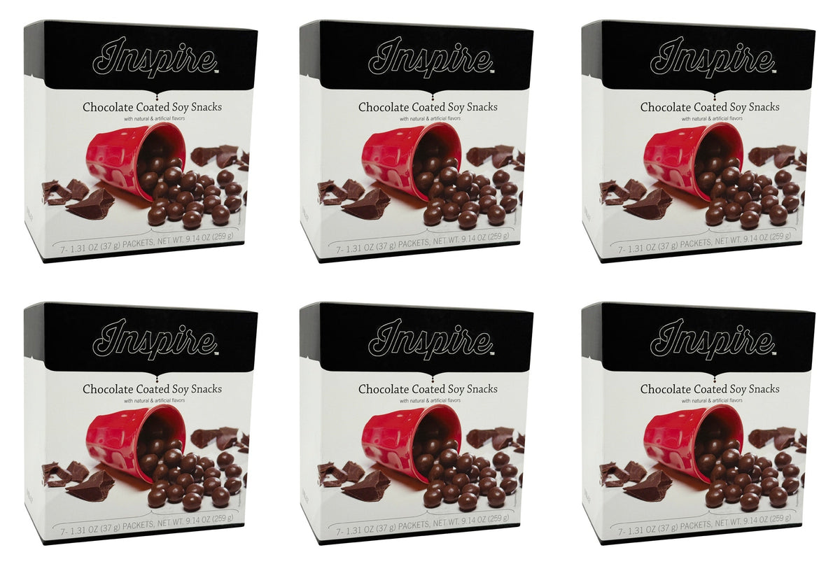 Six boxes of Inspire Chocolate Coated Soy Snacks are displayed, each featuring a red cup spilling chocolate-covered soy balls and pieces of chocolate on a white background.