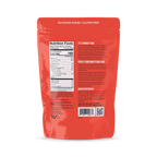 A bright red packaging displays the back of a snack product, featuring nutrition facts, ingredients, and promotional text about its health benefits and historical context, labeled as gluten-free and no sugar added.