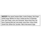 A list of ingredients for a food product, including vine-ripened tomatoes, various vinegars, spices, and flavorings, presented in a black box format with detailed descriptions of each component.