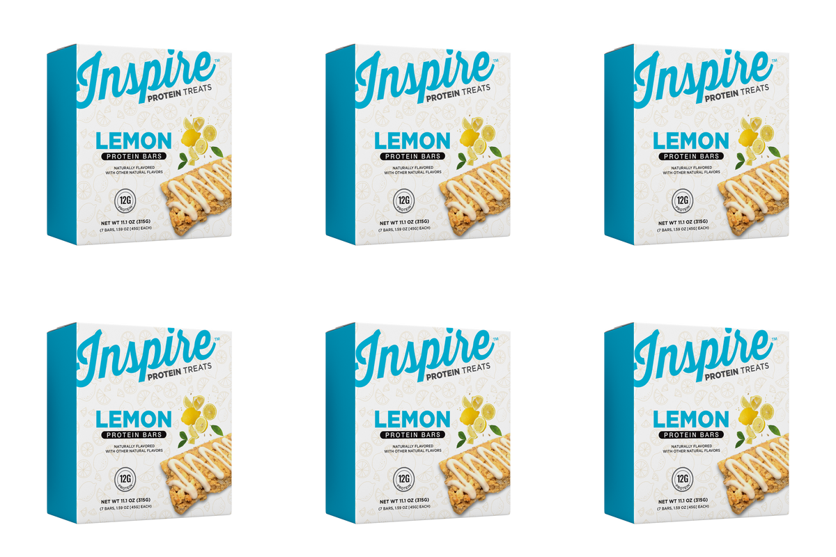 Six boxes of Inspire Lemon Protein Bars are displayed, each featuring a lemon-themed design, highlighting the product's flavor and nutritional information, including 12 grams of protein per bar.