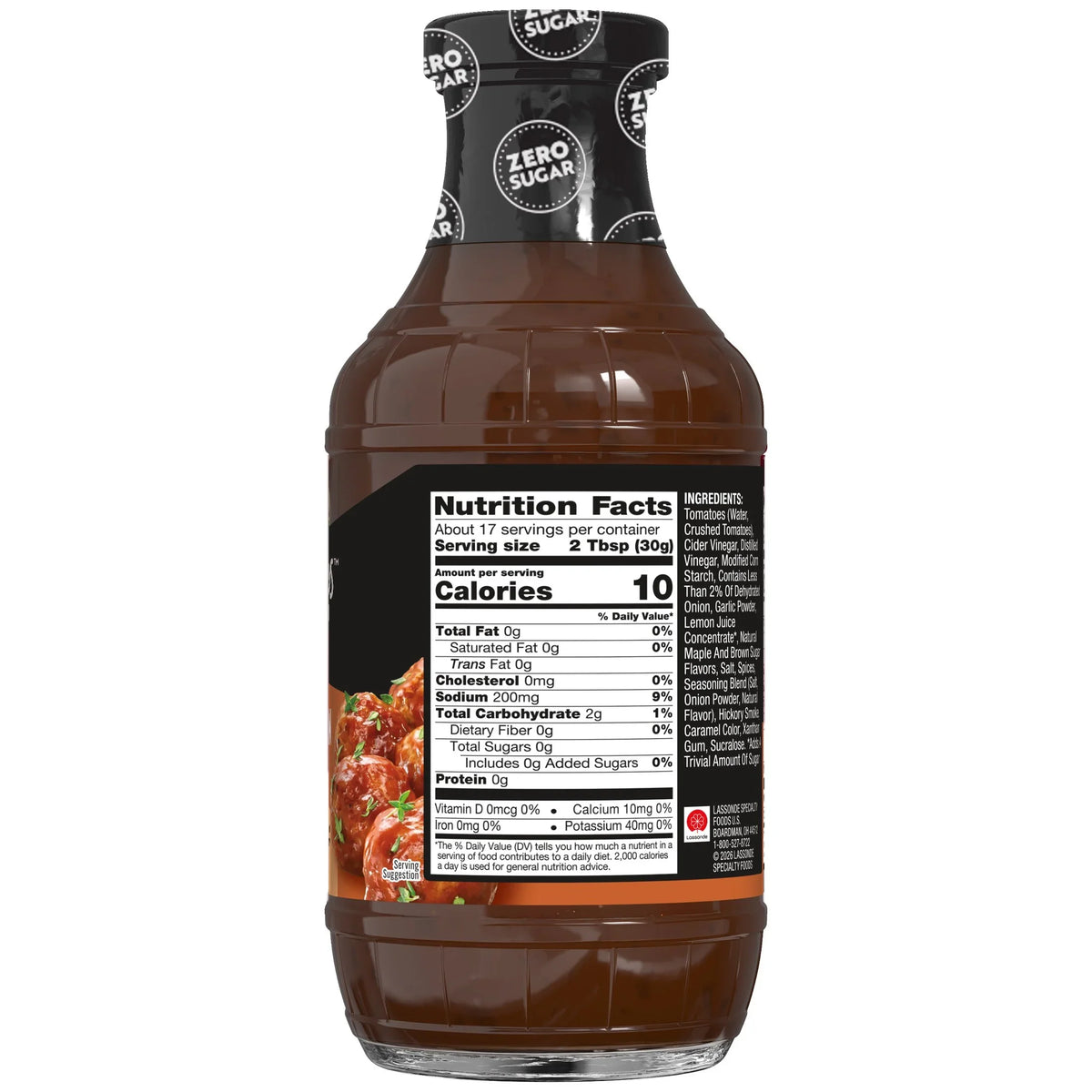A transparent bottle of zero sugar barbecue sauce displays nutrition facts and ingredients on its label, alongside a serving suggestion featuring glazed meat.