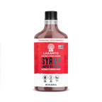 A bottle of Lakanto Maple Original Syrup, labeled as sugar-free, keto-friendly, and vegan, features a vibrant red design with nutritional information and a logo on a white background.