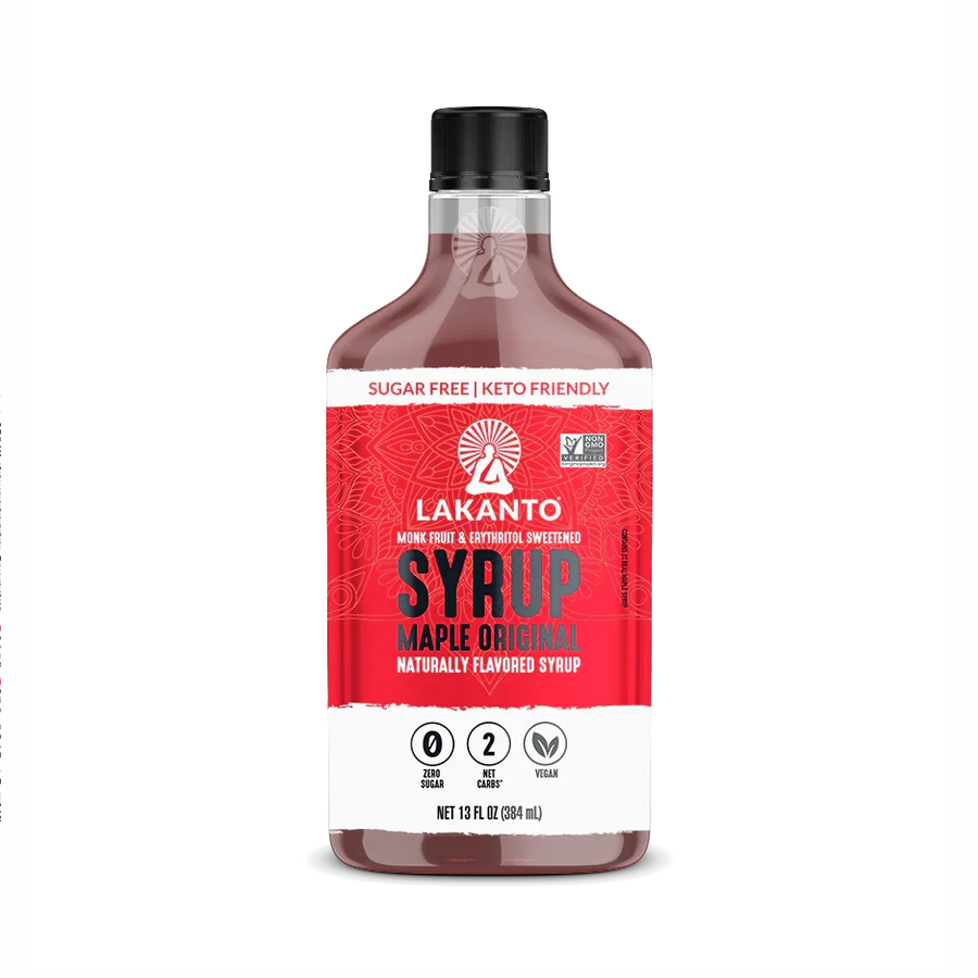 A bottle of Lakanto Maple Original Syrup, labeled as sugar-free, keto-friendly, and vegan, features a vibrant red design with nutritional information and a logo on a white background.