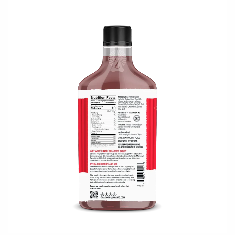 A clear bottle of maple-flavored syrup displays the nutrition facts and ingredients on the back, featuring a red label and a black cap, set against a simple background.