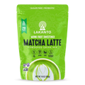 Bright green packaging of Lakanto Monk Fruit Sweetened Matcha Latte powdered drink mix features a decorative design, product name, and highlights like sugar-free, vegan, and probiotic benefits.