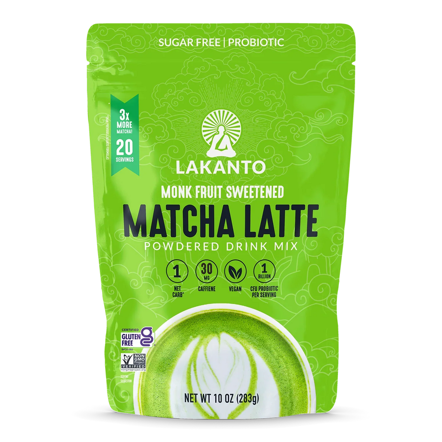 Bright green packaging of Lakanto Monk Fruit Sweetened Matcha Latte powdered drink mix features a decorative design, product name, and highlights like sugar-free, vegan, and probiotic benefits.