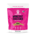 A bright pink package of Lakanto Monkfruit Sweetener with Erythritol, labeled as "Brown" and featuring icons for zero net carbs and keto-friendly, is displayed against a plain background.