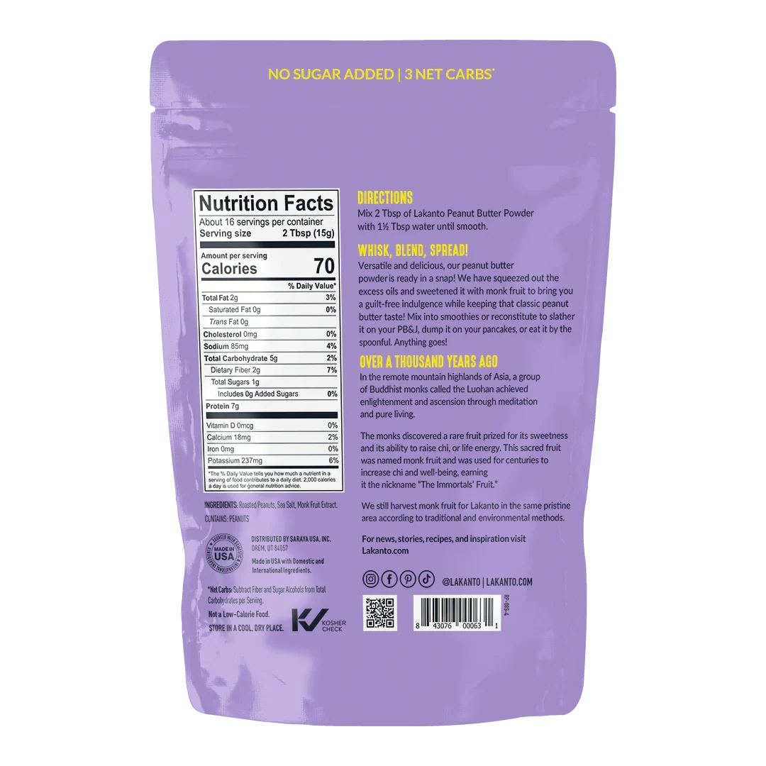 The back of a purple packaging for Lakanto Peanut Butter Powder displays nutrition facts, directions for use, and a brief history about monk fruit, emphasizing its health benefits and zero sugar content.